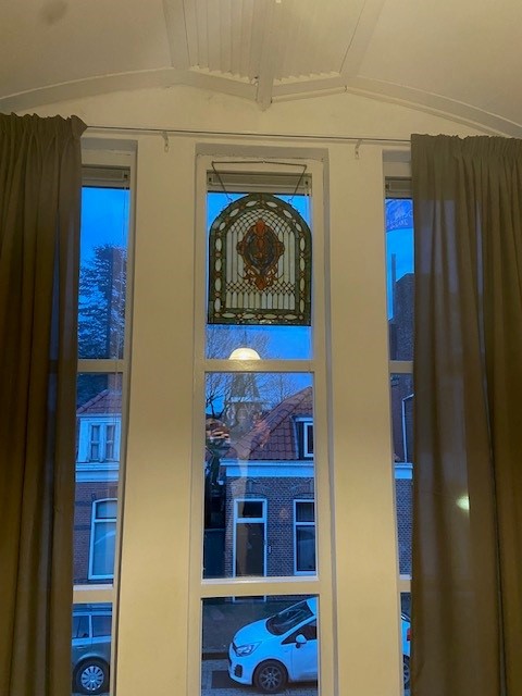 balkon glass and lead window